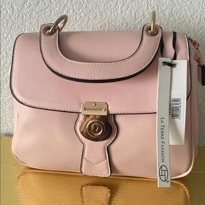 Elegant Pink Satchel with Gold Lock and Top Handle